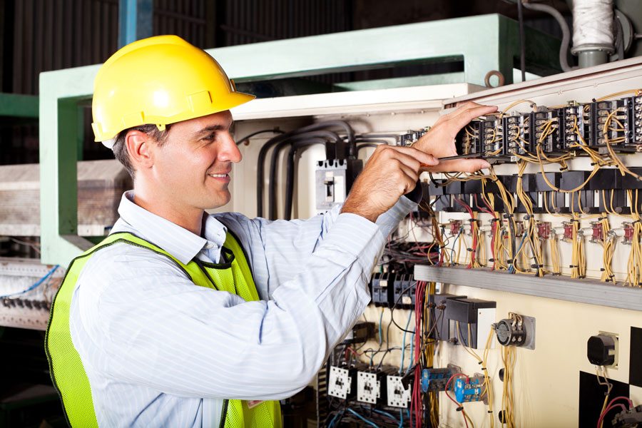 electrician working on electrical system